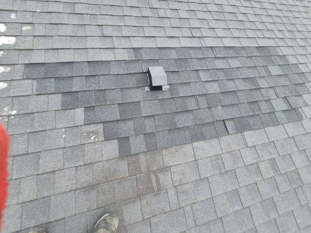 Fixed a leaking shower fan for a family in Clive, Iowa – super common winter condensation issue. Removed the old roof vent, relocated it six feet over to align straight above the pan, re-flashed, re-insulated, re-shingled. Clive roof leak repair. Clive bathroom exhaust venting. Clive shower fan fix.