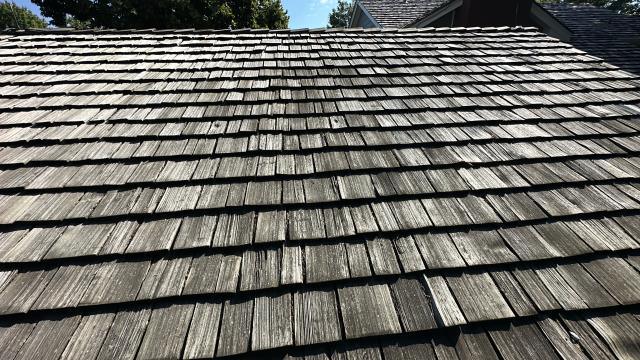 Adel, Iowa we replaced a cedar-shake roof, ensuring it was hail-resistant and durable. The 1¼" thick shakes were installed perfectly, looking brand new after a decade.  Inspection requested after a new hail storm.  No damages found.