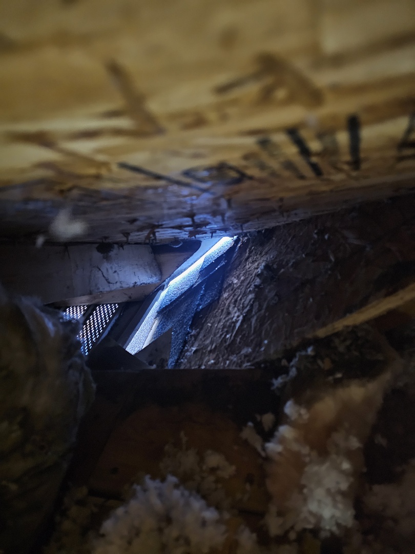 A homeowner reached out for help with water stains on their ceiling. We conducted a thorough inspection, examining both the interior and attic spaces. After climbing onto the roof, we identified an improperly installed flashing area as the source of the issue. Our team will remove the faulty flashing and reflash it to ensure a proper installation, preventing further water infiltration. This solution will protect the homeowner's home from future water damage, providing peace of mind and a dry living environment.