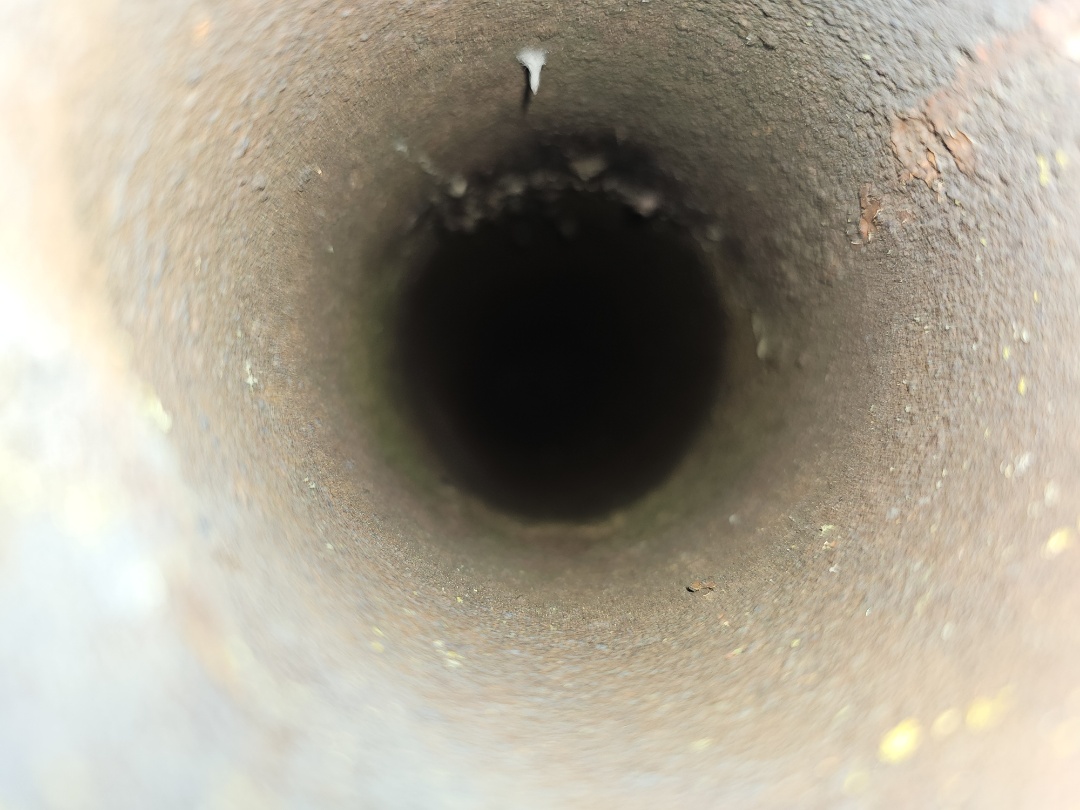 A homeowner contacted us about a leak and staining on their kitchen ceiling. Upon inspection, we found a lead pipe protruding from the ceiling, right where the stain was. The boot around the pipe was clogged with pine needles and pine cones. We removed the ceiling fan to access the pipe and thoroughly cleaned it. We also replaced the boot to ensure a proper seal. This resolved the leak and prevented future issues. The homeowner was pleased with the work, and the problem was successfully addressed.