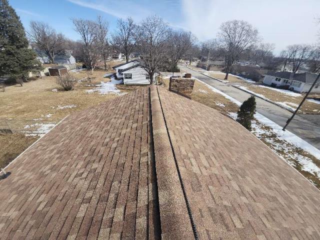 Following a hail storm, we assessed the roof damage and installed a new roofing system. Our customer was delighted with the professional and efficient results.