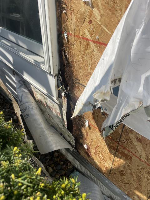We replaced rotten wood around the front window, sealed it, added new house wrap, and reinstalled the siding. The homeowner is delighted with the improved appearance and protection.