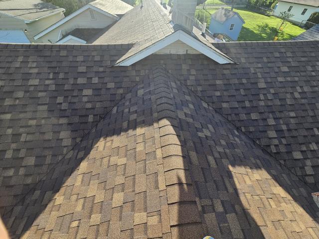 We replaced the entire roof, fixed the fascia, and installed new gutters. The transformation was remarkable, restoring the home's integrity and appearance.