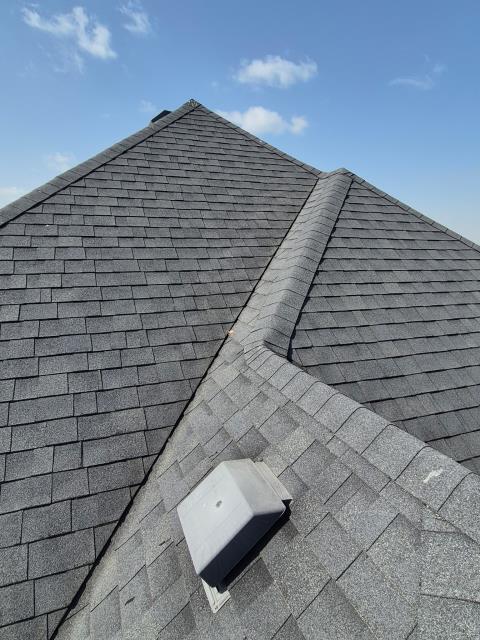 The homeowner contacted us to address algae on his roof. We applied a soft spray to eliminate the algae, restoring the roof's appearance. The result was a refreshed, vibrant roof.