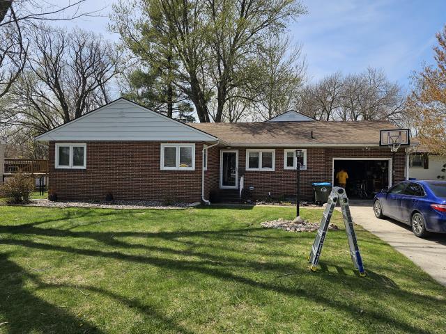 After a severe hail storm, we installed a new, vibrant roof that transformed the home's appearance, providing both protection and a fresh, modern look.