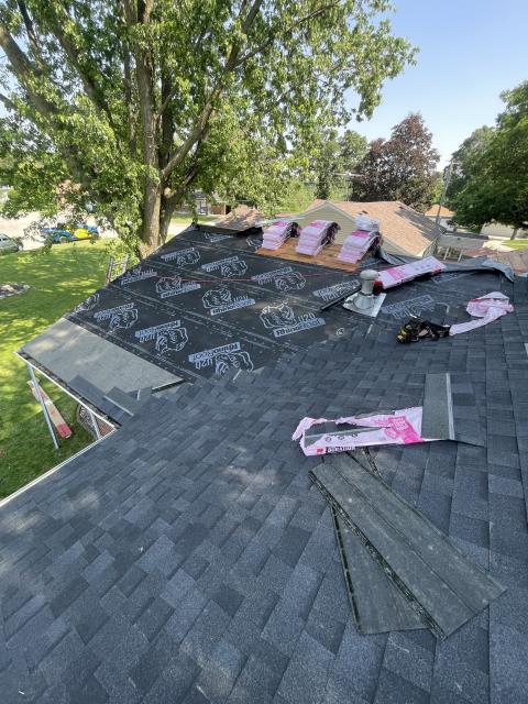 After a severe hail storm, we installed a new, vibrant roof that transformed the home's appearance, providing both protection and a fresh, modern look.