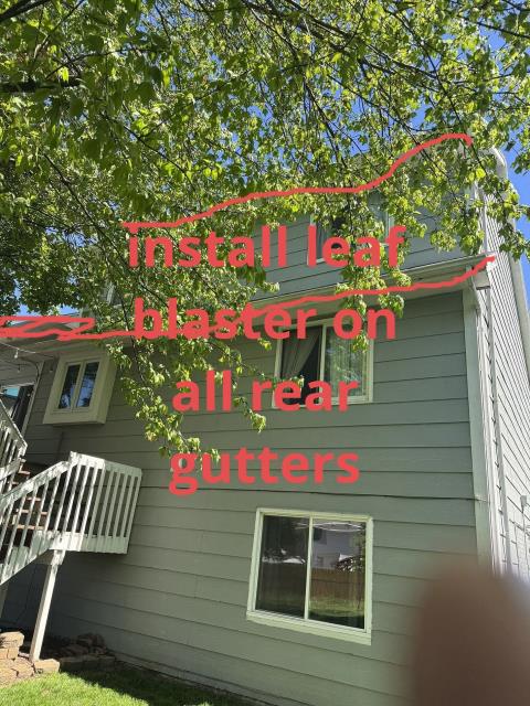 We securely reattached the gutters, ensuring proper drainage. We also installed the Leaf Blaster system to prevent future clogs and maintain clean gutters.