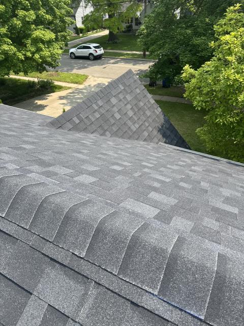 We installed a new roof with high-quality shingles and modified bitumen, transforming the flat roof area into a stunning, durable surface. The result was a flawless, visually appealing roof.