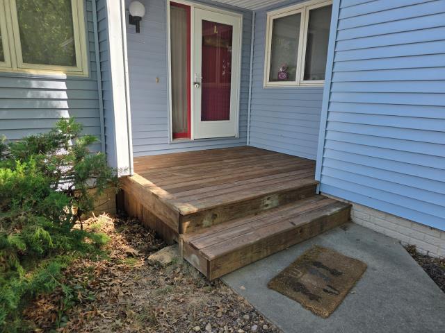 We installed a new roof, siding, gutters, fascia, soffit, and front deck, giving the home a fresh, modern look. The homeowner was thrilled with the transformation.