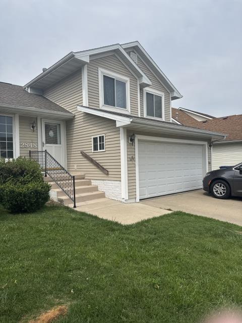 We installed a new roof, replacing the old one entirely. The homeowner opted for a complete overhaul to fix a leak, resulting in a refreshed appearance and a leak-free home.