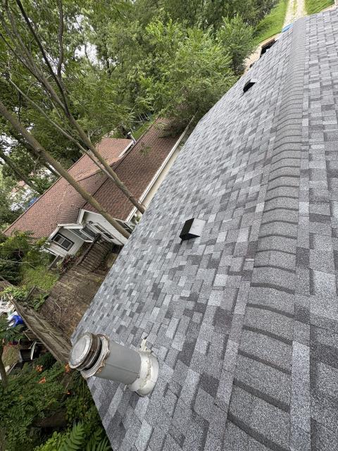 We replaced the entire roof, ensuring a perfect fit and high-quality materials. The homeowner was thrilled with the improved aesthetics and enhanced protection.