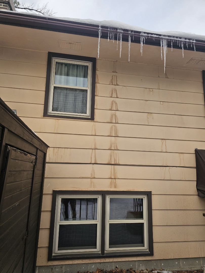 A property owner reached out for a repair and full roof replacement estimate due to rough conditions. Upon inspection, significant wind and hail damage was identified, along with condensation issues causing moisture on the sidewalk. Gutters showed signs of past wind damage. The siding area requires attention, with four specific areas needing repair. A comprehensive assessment was conducted to provide an accurate estimate for the necessary repairs and roof replacement. The inspection aimed to address all identified issues to ensure the property's structural integrity and functionality.