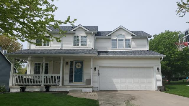 We installed a durable new roof, along with fresh gutters and gutter guards on the front of the home, ensuring optimal protection and improved aesthetics.