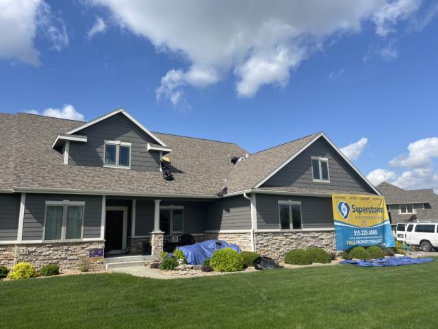 We replaced the old roof with a new Owens Corning Driftwood roof, matching the previous color. The installation was meticulous, ensuring durability and aesthetic appeal.