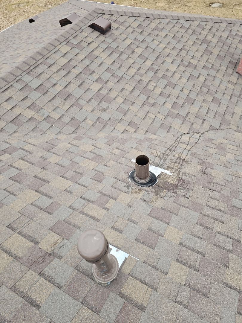 A homeowner contacted us due to water dripping in their basement, originating from a pipe. A plumber had previously inspected the situation and suggested that the flashing around the pipe, which penetrates the roof, might be leaking. Upon thorough examination, we confirmed that the flashing was correctly installed and not the source of the leak. We conducted a test by pouring water down the pipe, and as soon as the water passed through, we identified a leak in the basement. We informed the homeowner that the issue was likely a faulty pipe joint within the house and advised them to contact a local plumber for further inspection and repair. This ensured the leak would be properly addressed.