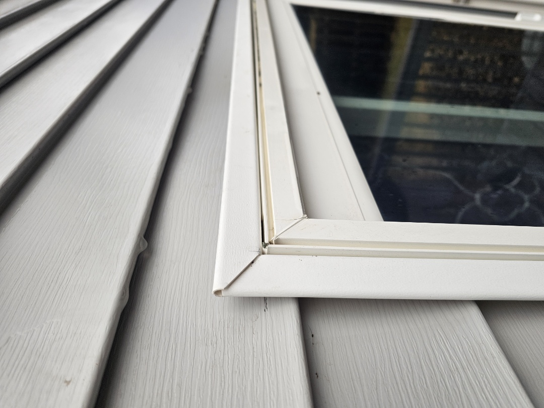 Following a heavy rainfall, the homeowner noticed water seeping around the kitchen window and patio door. Concerned, they contacted us for an inspection. Upon examination, we discovered that the original installation lacked drip caps over the window and doors, causing the leaks. We promptly organized a team to address the issue. Next week, they will install the necessary drip caps to prevent future leaks, ensuring the home remains dry and secure. Our goal is to provide a thorough solution, enhancing the home's protection against the elements.