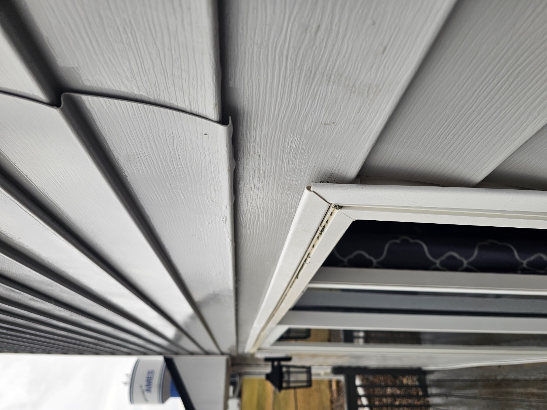 Following a heavy rainfall, the homeowner noticed water seeping around the kitchen window and patio door. Concerned, they contacted us for an inspection. Upon examination, we discovered that the original installation lacked drip caps over the window and doors, causing the leaks. We promptly organized a team to address the issue. Next week, they will install the necessary drip caps to prevent future leaks, ensuring the home remains dry and secure. Our goal is to provide a thorough solution, enhancing the home's protection against the elements.