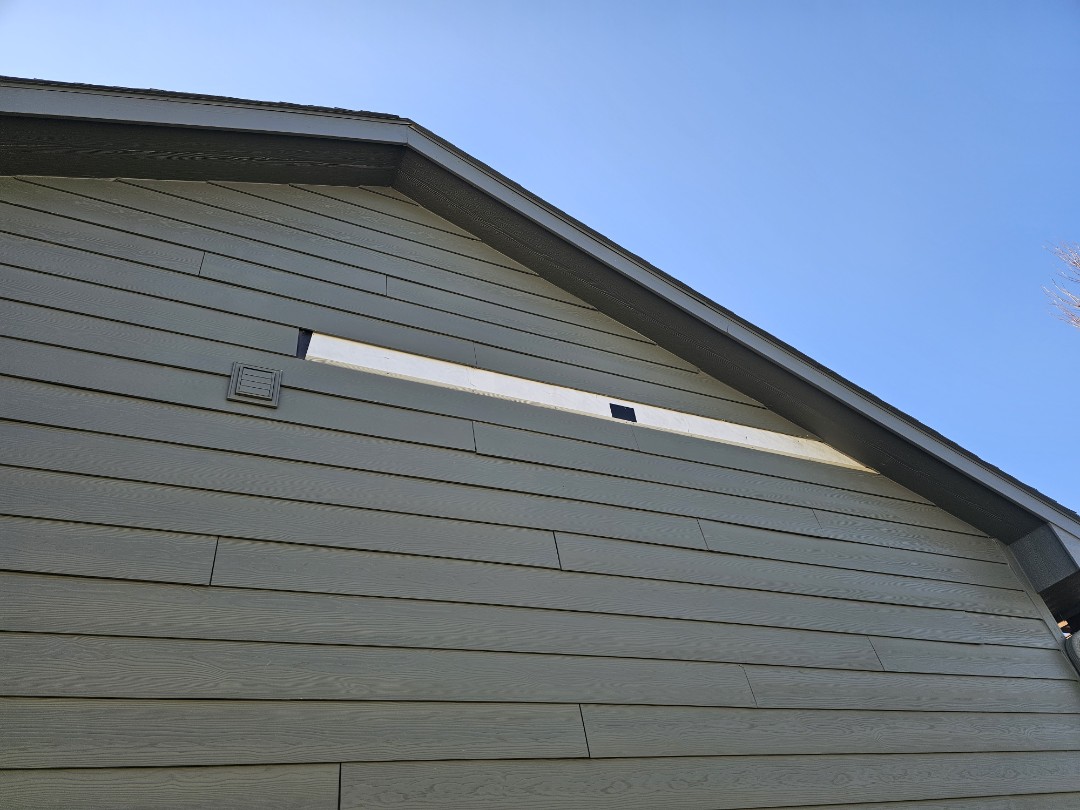 A property owner reached out to us after severe winter storms and high winds caused damage to their James Hardie siding. The siding had been blown off the side of the house, leaving gaps and exposed areas. We conducted a thorough evaluation, assessing the extent of the damage and identifying necessary repairs. We provided a detailed estimate, outlining the required materials and labor for the repairs and painting. The property owner was satisfied with the quality and professionalism of the service provided.