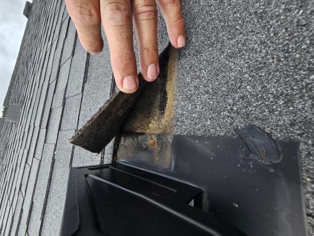 We inspected the roof and identified a ripped shingle near a vent. We sealed the shingle, preventing further leaks. The homeowner has since reported no more issues.