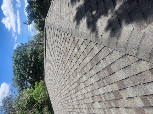 We installed a durable, aesthetically pleasing roof, enhancing the home's curb appeal and protection for the tenants.