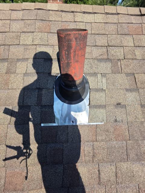 We identified roof leaks around the chimney and a roof pipe. We repaired both areas, ensuring proper sealing to prevent future leaks.