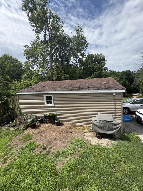 We addressed a garage roof issue by removing rotted OBS beneath the shingles. We replaced the damaged wood and shingled the roof to match the house, ensuring a secure and durable finish.
