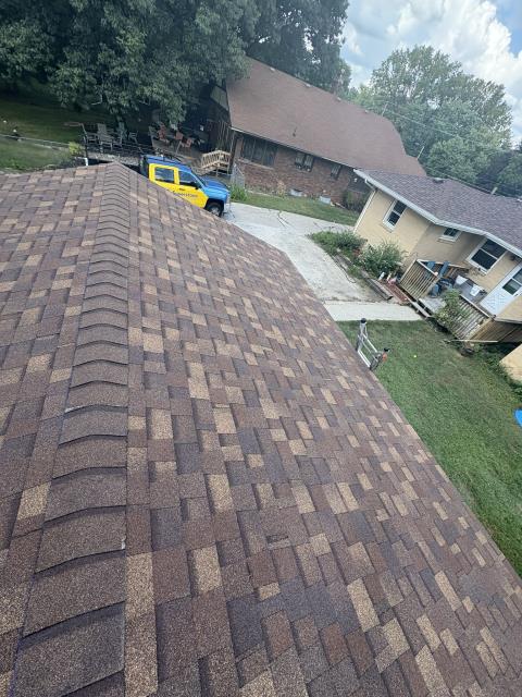 We addressed a garage roof issue by removing rotted OBS beneath the shingles. We replaced the damaged wood and shingled the roof to match the house, ensuring a secure and durable finish.