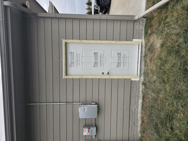 We installed a new door leading to the yard from the garage, enhancing the home's access and aesthetics. The result is a seamless, functional addition.