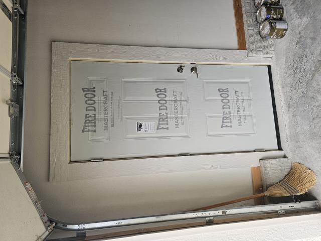 We installed a new door leading to the yard from the garage, enhancing the home's access and aesthetics. The result is a seamless, functional addition.