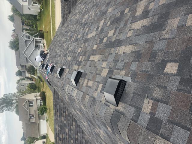 We installed a durable new roof and added a functional downspout, ensuring efficient water drainage and enhancing the home's overall appearance.