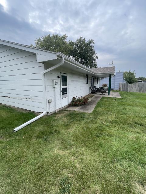 We replaced all siding, transitioning from white to a stunning green. The new siding enhances curb appeal and protects the structure.