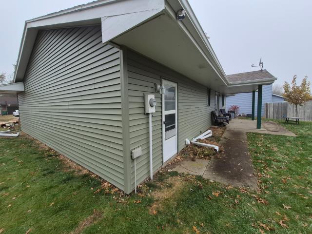 We replaced all siding, transitioning from white to a stunning green. The new siding enhances curb appeal and protects the structure.