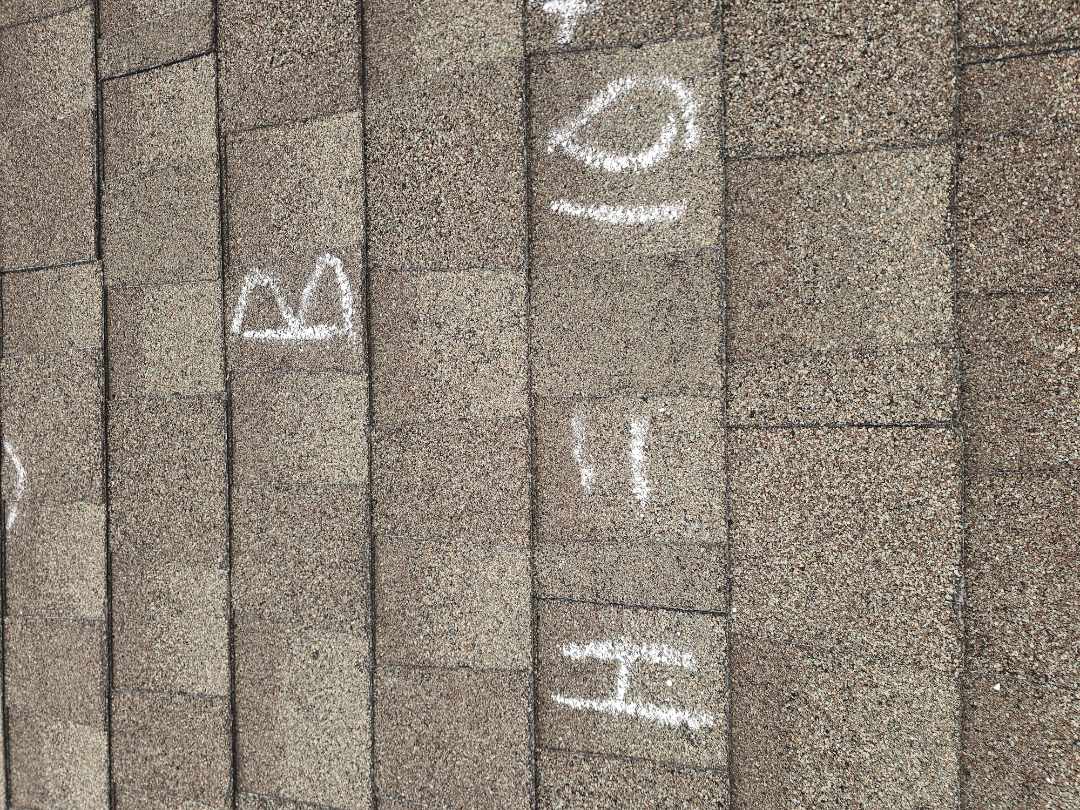 A thorough inspection was conducted following a recent hailstorm. Damages were identified on the downspouts, as well as the south and west elevations of the roof. The inspection involved a detailed examination of the affected areas, ensuring all damage was documented. This included assessing the extent of the damage to the downspouts and the roof surfaces. Photographs and detailed notes were taken to support a potential claim with the insurance provider. The homeowner was guided through the process, ensuring they understood the damage and the steps needed to file a claim. The inspection aimed to provide a comprehensive report to facilitate a sm