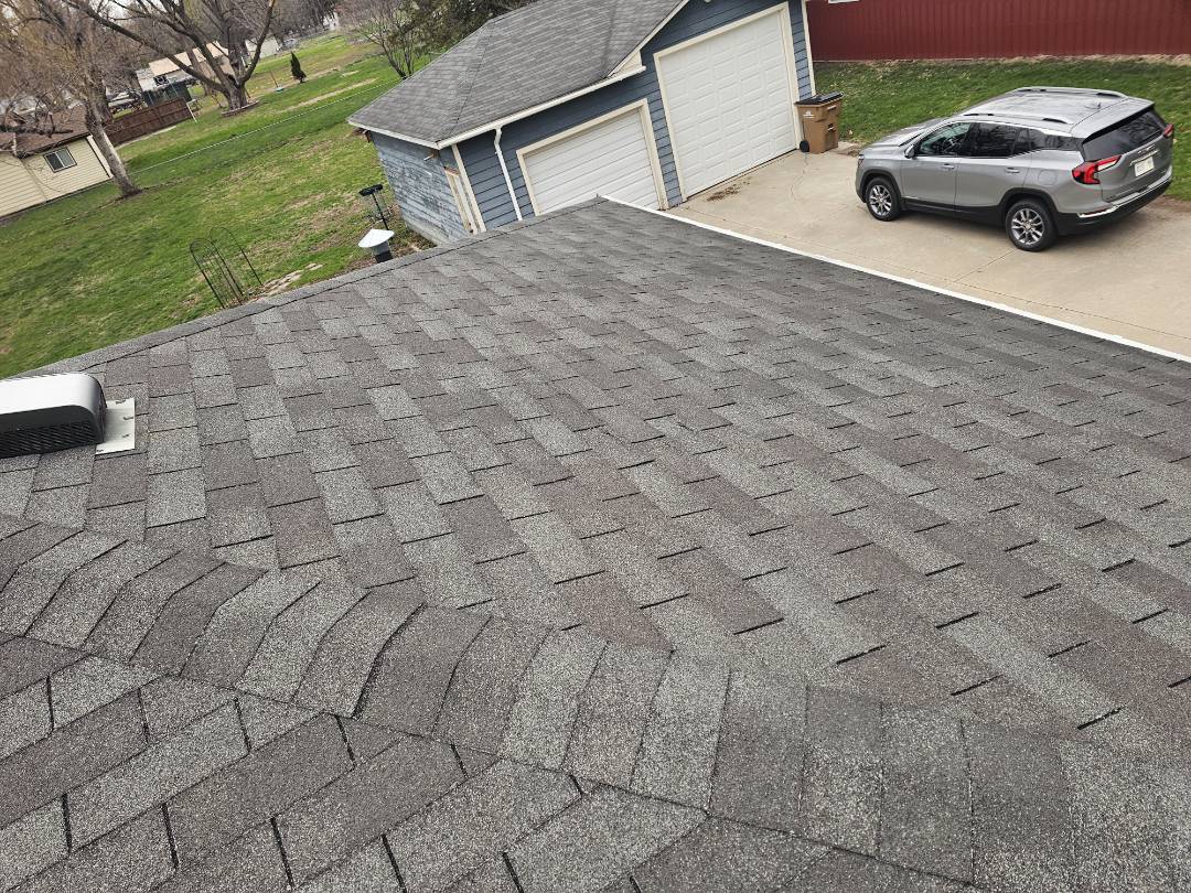 A comprehensive inspection of the property was conducted, focusing on the house roof and garage. Detailed physical measurements were taken to ensure accuracy. Two roof estimates were prepared for the homeowner, considering their needs for impact-resistant shingles. The first estimate featured Class Three impact-resistant shingles, while the second option included Class Four impact-resistant shingles, both offering a fifty-year warranty. This thorough evaluation provided the homeowner with informed choices for their roofing needs, ensuring durability and protection against potential weather-related damage.