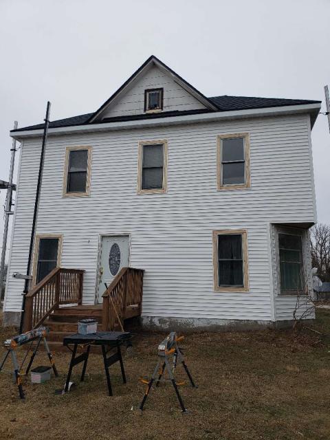 We installed a brand-new roof, complete with seamless gutters, energy-efficient windows, protective window wraps, and fresh siding to enhance curb appeal.
