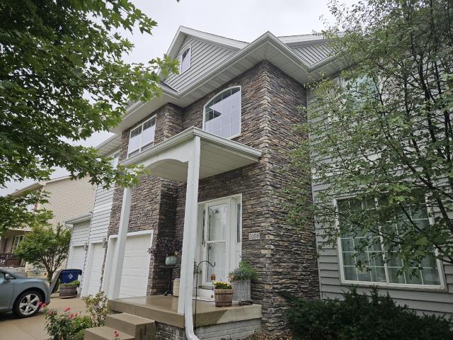 I replaced the old siding on the left side of the house, ensuring a perfect fit and seamless appearance. The new siding enhances curb appeal and protects the structure.