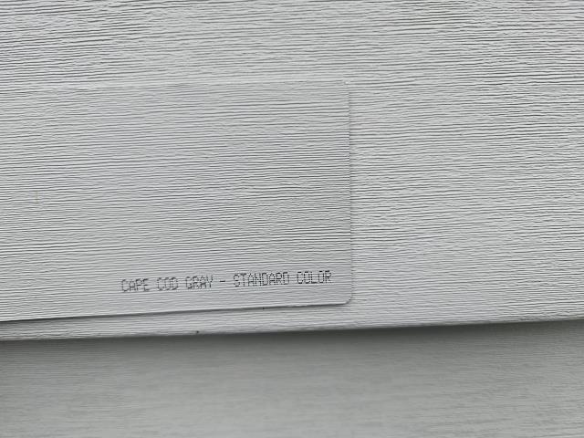 I replaced the old siding on the left side of the house, ensuring a perfect fit and seamless appearance. The new siding enhances curb appeal and protects the structure.