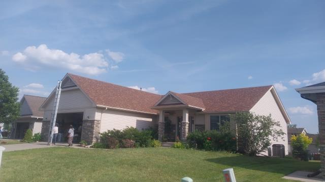 We replaced the entire roof, removing damaged shingles and installing new ones to ensure a secure, weather-resistant finish after the hail storm.