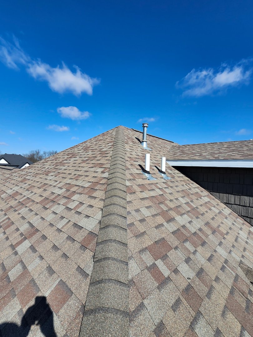 A homeowner contacted us after filing a claim with their insurance company due to engine 3 hail. They requested a full inspection of their property. The adjuster was scheduled to visit the next day. During the inspection, we identified that some ridgecap shingles had been blown off. Fortunately, the gutters, downspouts, and accessories were undamaged. Upon climbing onto the roof, we found that the roof still had six to 10 years of life left but required a complete service and sealan