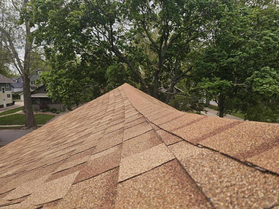 A homeowner contacted us for a roof evaluation due to sagging and concerns about a low center beam. Upon arrival, we conducted a thorough inspection and confirmed the beam was indeed sagging about six inches. We devised a plan to address the issue by jacking up the beam and reinforcing the center rafter. We then created a detailed estimate for the necessary support and materials. Our team worked diligently to implement the solution, ensuring the ridge was raised and the roof's structural integrity was restored. The homeowner was pleased with the results