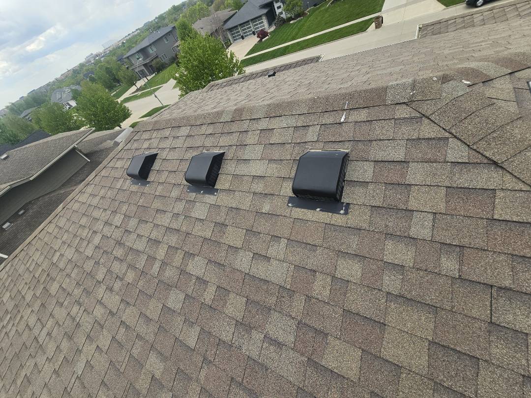 A homeowner reached out with concerns about staining on their living room ceiling. After conducting a thorough inspection, it was determined that the original roof was failing, leading to water penetration due to an improperly installed box vent. A temporary solution was provided, including spray sealant for the stained ceiling, ensuring the homeowner could manage until a permanent fix was implemented. Additionally, the new roof was expected to last 5 to 7 more years. The homeowner was informed about the benefits of post-storm inspections and future assista