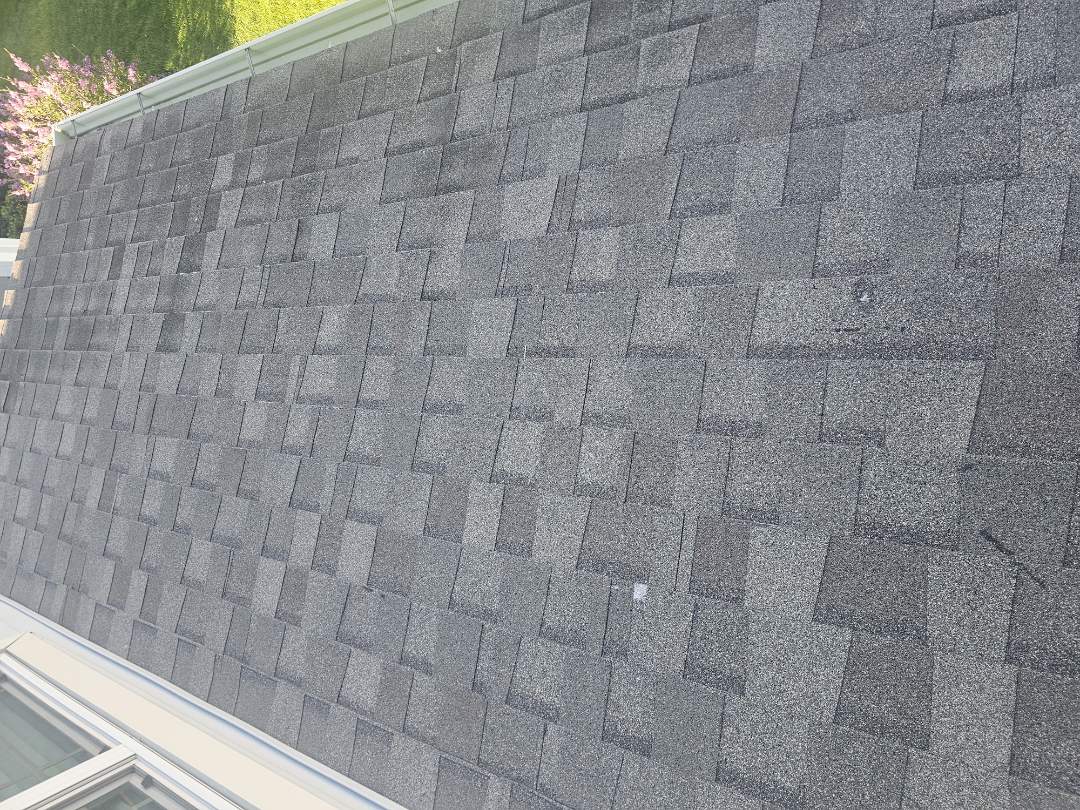 A property owner contacted us regarding issues with their front header, which was severely rotted due to improper flashing. Upon arrival, we conducted a thorough inspection and identified additional hail damage to the siding. We climbed onto the roof, which is a fingo, and found potential hail damage. We proposed a solution to replace the damaged header and suggested a new roof to address the hail damage. The homeowner is now deciding whether to discuss the issue with the home builder or file an insurance claim. We provided a detailed estimate for both