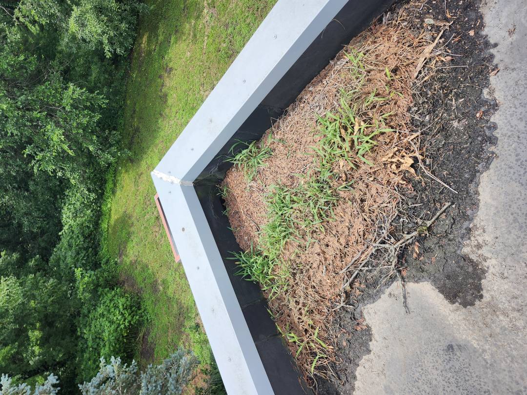 After a severe storm, a homeowner reached out for assistance. The heavy rains overwhelmed the drainage system, causing significant issues. Upon inspection, it was clear that the flat roof drainage was blocked, leading to water accumulation and potential leaks. Unlike previous contractors, we identified this critical issue and informed the homeowner. We cleaned the blocked drainage areas and performed temporary repairs to mitigate immediate risks. We recommended monitoring the situation and suggested that a full roof replacement was not necessary at