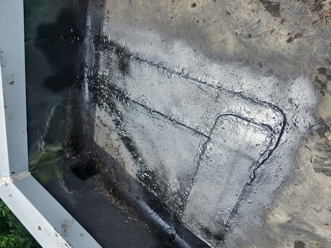 After a severe storm, a homeowner reached out for assistance. The heavy rains overwhelmed the drainage system, causing significant issues. Upon inspection, it was clear that the flat roof drainage was blocked, leading to water accumulation and potential leaks. Unlike previous contractors, we identified this critical issue and informed the homeowner. We cleaned the blocked drainage areas and performed temporary repairs to mitigate immediate risks. We recommended monitoring the situation and suggested that a full roof replacement was not necessary at
