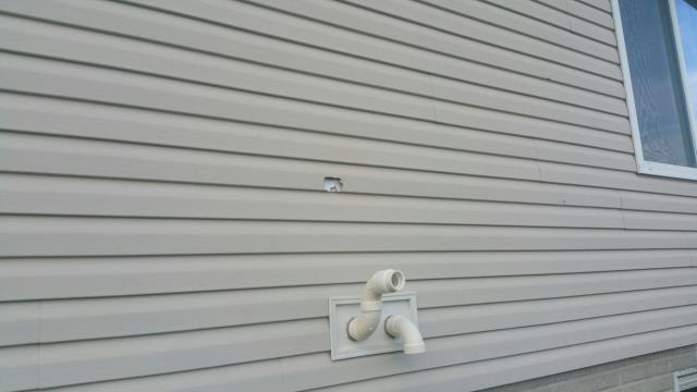 Out here in Bondurant, we completely replaced the old roofing and meticulously repaired the siding, ensuring a fresh, durable finish for the home.