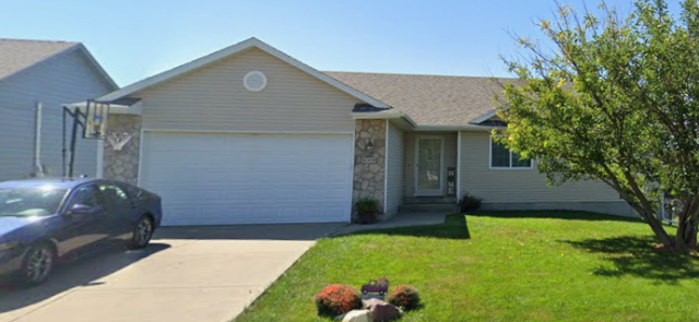 Out here in Bondurant, we completely replaced the old roofing and meticulously repaired the siding, ensuring a fresh, durable finish for the home.