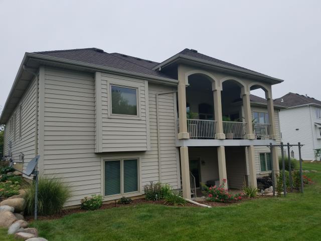 We replaced the entire roof and repaired the siding at this Johnston home, ensuring a fresh, durable finish.