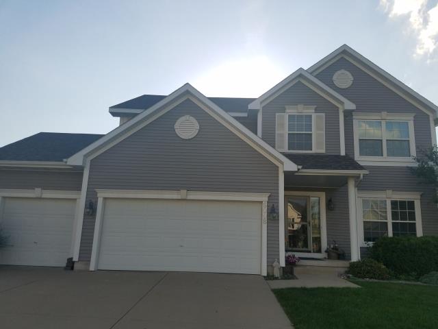 We completed a comprehensive roofing replacement at this Johnston home, removing old shingles and installing a new, high-quality roof to ensure durability and protection for the home.