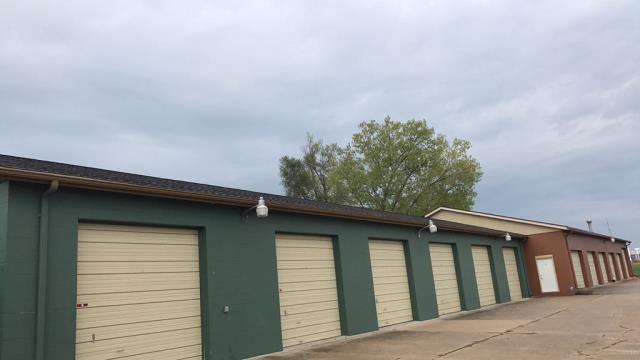We completed a comprehensive roofing replacement on this commercial building in Grimes, Iowa, removing the old roofing and installing high-quality new materials.