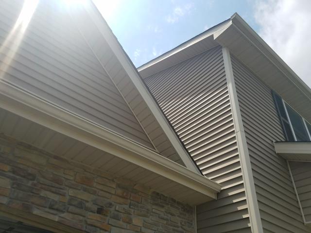 Completed a thorough roof repair on this Johnston, IA home, replacing damaged shingles. We also repaired the gutters to ensure proper drainage and help protect the home from future water damage.